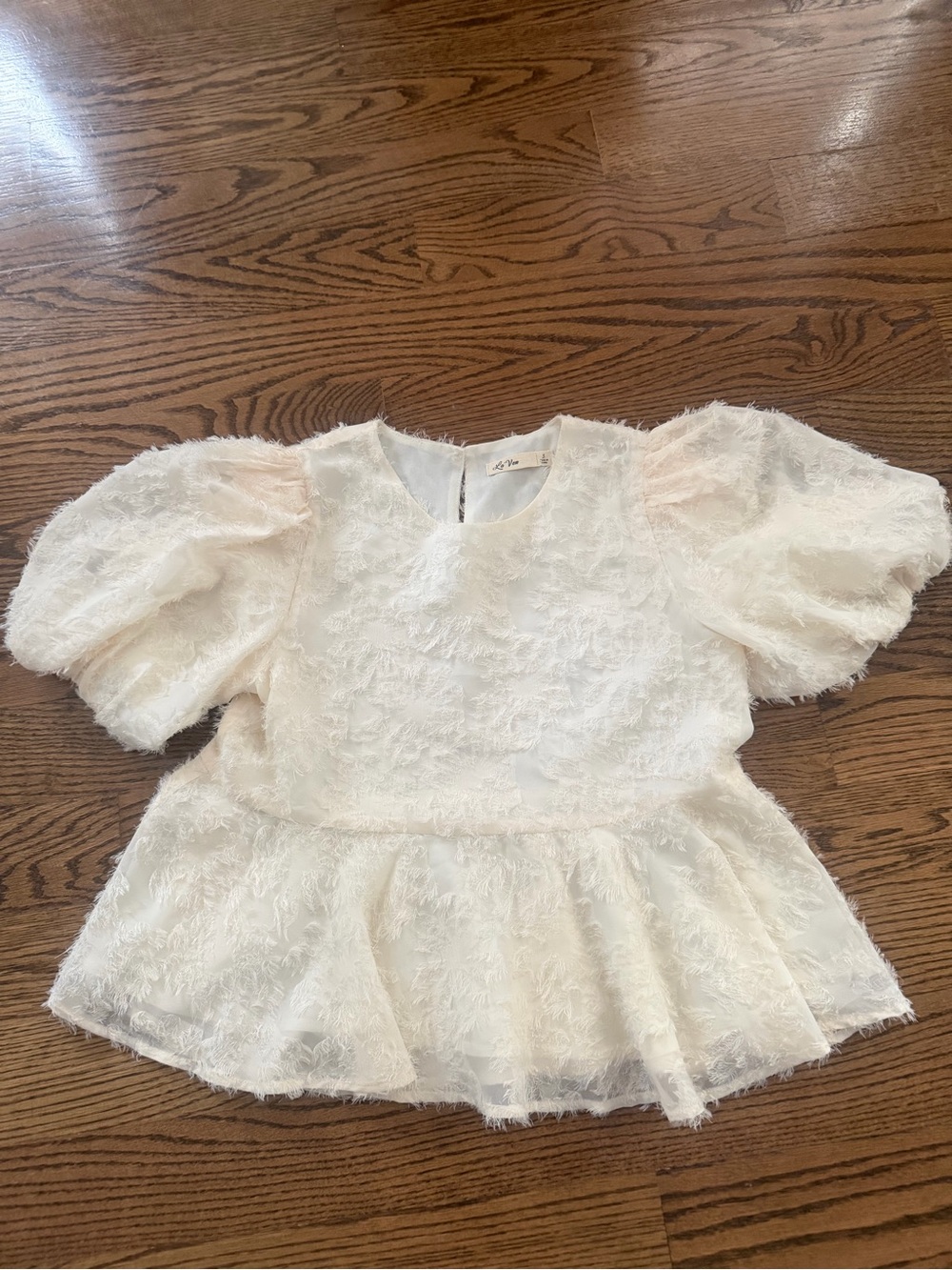Cream Textured Puff-Sleeve Peplum Top